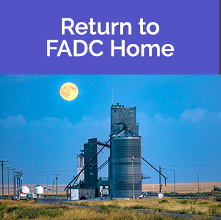 metal silo with full moon