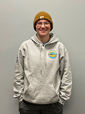 Averie long sleeve grey sweatshirt and orange knit cap